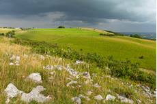 Landscape view of stormy skies and grassland, Draycott Sleights, Somerset, England, UK, August